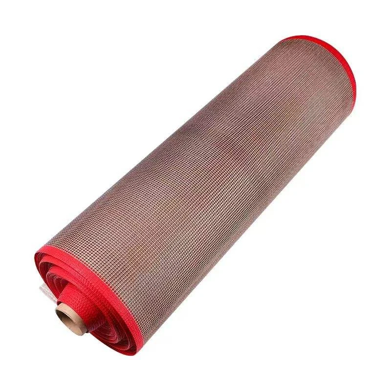PTFE mesh panel with a red border rolled for handling
