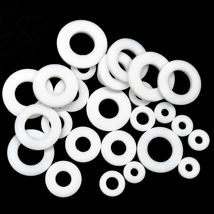 White PTFE flat washers with different inner and outer diameters