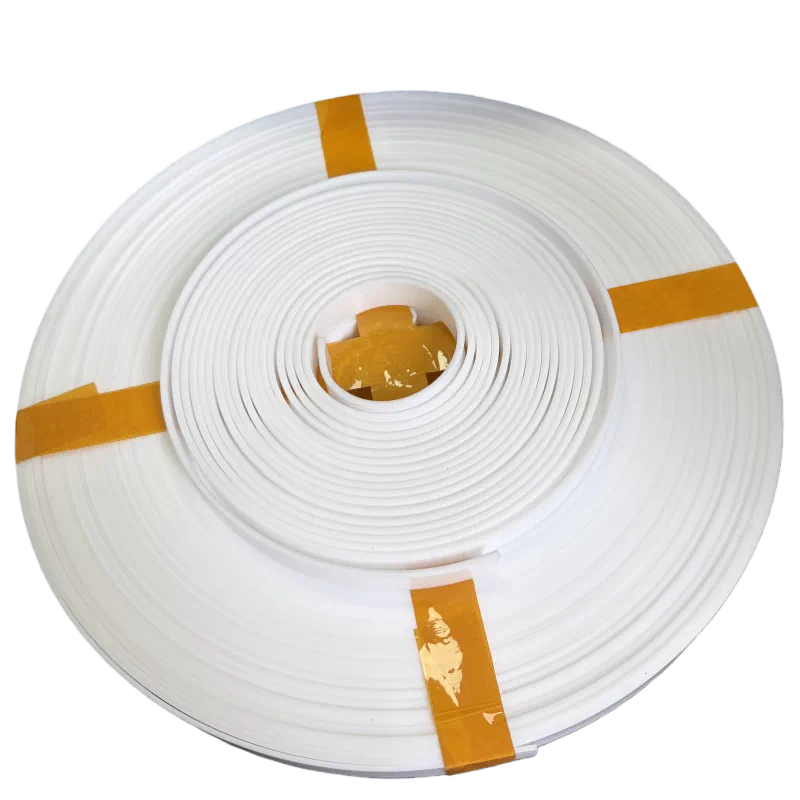 A flat white PTFE guide-strip coil secured with yellow tape
